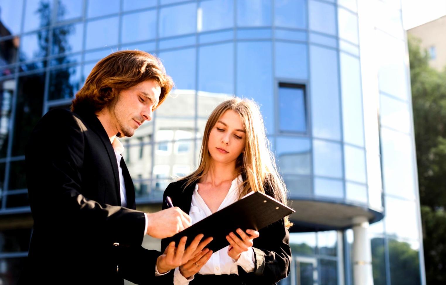 Business professionals analyzing financial data and investment options